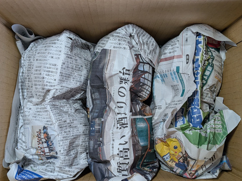 完熟柿と大きいリンゴ